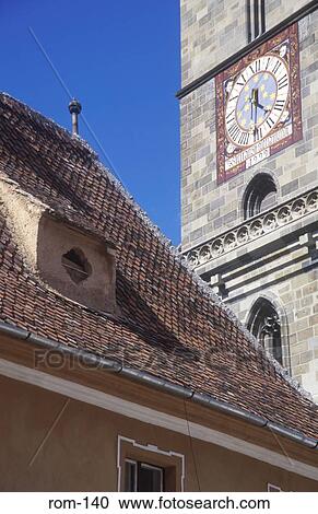 Stock Image - View over Tiled Roof of Black Church Clock Tower Brasov Romania. Fotosearch
