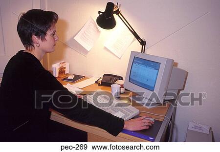 Woman at Desk Using Mouse View Large Photo Image Stock Photo - Woman at Desk Using Mouse. Fotosearch