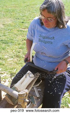 Woman Carving Wood with Spokeshave Wales UK View Large Photo Image Stock Photo - Woman Carving Wood with Spokeshave Wales UK. Fotosearch
