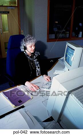 Woman in Police Office using Telephone Headset View Large Photo Image Stock Image - Woman in Police Office using Telephone Headset. Fotosearch