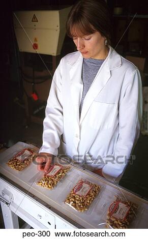 Woman in White Coat in Food Production Line View Large Photo Image Stock Image - Woman in White Coat in Food Production Line. Fotosearch