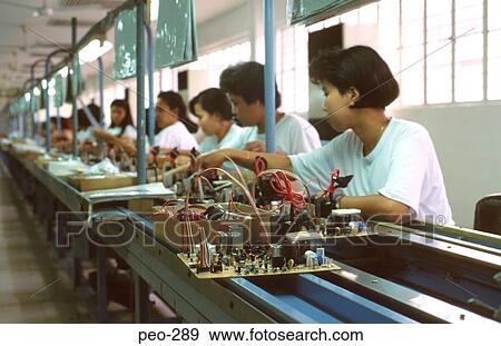 Stock Photo - Women Working in Electronics Factory Thailand. Fotosearch