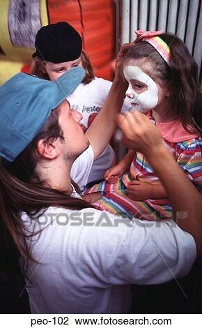 Young Girl Having her Face Painted UK View Large Photo Image Stock Image - Young Girl Having her Face Painted UK. Fotosearch