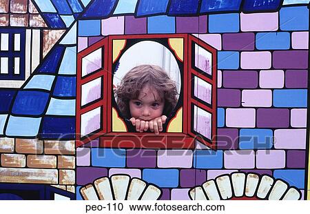 Young Girl Looking Through Window of Colourful Mural View Large Photo Image Stock Image - Young Girl Looking Through Window of Colourful Mural. Fotosearch
