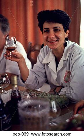 Young Woman Smiling Holding Brandy Glass View Large Photo Image Stock Photo - Young Woman Smiling Holding Brandy Glass. Fotosearch