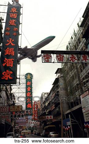 Airliner Low over a Kowloon Street Hong Kong View Large Photo Image Stock Photography - Airliner Low over a Kowloon Street Hong Kong. Fotosearch