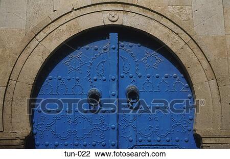 Stock Image - Arched Blue Door Sousse Tunisia. Fotosearch