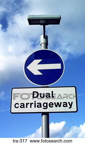 Stock Photo - Arrow Sign on Dual Carriageway UK. Fotosearch