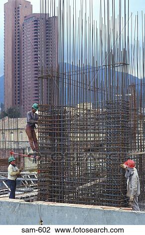 Stock Image - Builders Working on Steel Frame Bogota Colombia. Fotosearch