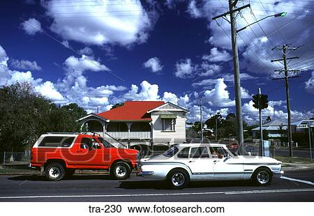Cars at a Junction in front of an Australian House View Large Photo Image Stock Image - Cars at a Junction in front of an Australian House. Fotosearch