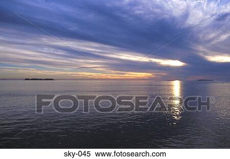 Cirrocumulus Clouds at Sunset over Sea View Large Photo Image Stock Photography - Cirrocumulus Clouds at Sunset over Sea. Fotosearch