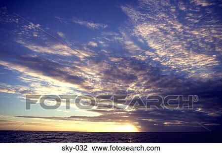 Cirrus Cloud over the Sea at Sunset View Large Photo Image Stock Image - Cirrus Cloud over the Sea at Sunset. Fotosearch