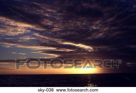 Cirrus Cloud over the Sea at Sunset View Large Photo Image Stock Photo - Cirrus Cloud over the Sea at Sunset. Fotosearch