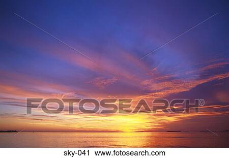 Cirrus Clouds in Sky at Sunset over Sea View Large Photo Image Stock Image - Cirrus Clouds in Sky at Sunset over Sea. Fotosearch