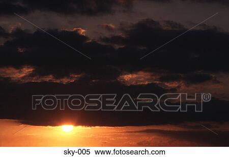 Cumulus obscuring the Evening Sun View Large Photo Image Stock Photography - Cumulus obscuring the Evening Sun. Fotosearch
