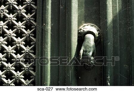 Door Knocker in the Shape of a Hand Stockholm Sweden View Large Photo Image Stock Photo - Door Knocker in the Shape of a Hand Stockholm Sweden. Fotosearch