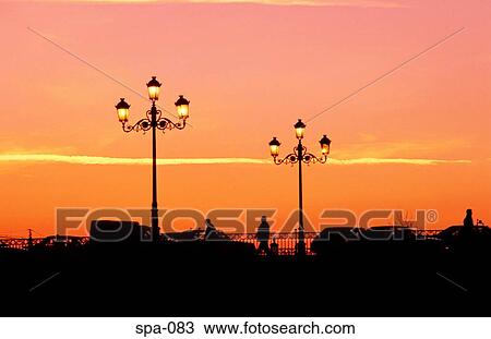 Stock Image - Evening Sky behind Promenade Seville Spain. Fotosearch