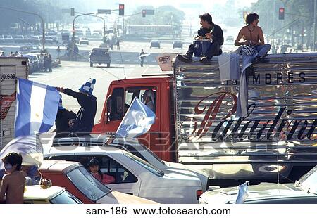 Football Supporters Climbing on Cars Argentina View Large Photo Image Stock Photograph - Football Supporters Climbing on Cars Argentina. Fotosearch