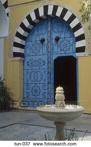 Fountain and Ornate Arched Door Sousse Tunisia View Large Photo Image Stock Photo - Fountain and Ornate Arched Door Sousse Tunisia. Fotosearch