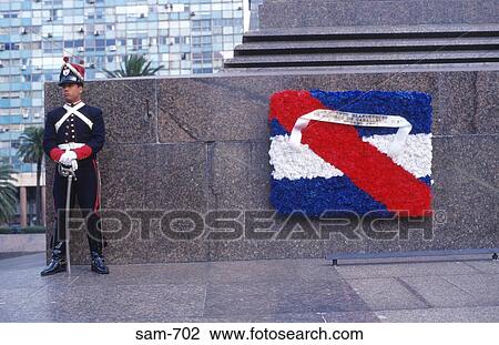 Stock Image - Guard and Flag at Artigas Statue Montevideo Uruguay. Fotosearch