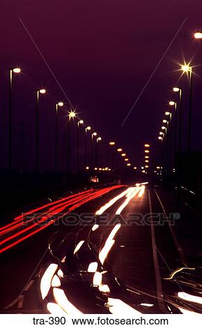 Stock Image - Long Exposure Photograph of Car Lights at Night. Fotosearch