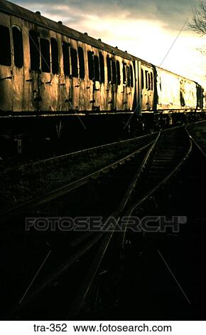 Low Sun Reflecting off Disused Railway Carriages View Large Photo Image Stock Image - Low Sun Reflecting off Disused Railway Carriages. Fotosearch