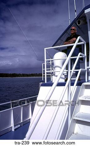Man on Deck of a Boat Australia View Large Photo Image Stock Photo - Man on Deck of a Boat Australia. Fotosearch