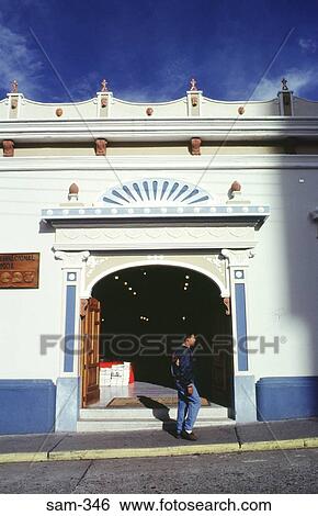 Man Passing Colonial Style Building Merida Venezuela View Large Photo Image Stock Photograph - Man Passing Colonial Style Building Merida Venezuela. Fotosearch