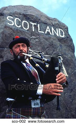 Man Playing Bagpipes in Scotland View Large Photo Image Stock Image - Man Playing Bagpipes in Scotland. Fotosearch