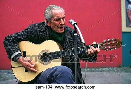 Man Playing Guitar La Boca Buenos Aires Argentina View Large Photo Image Picture - Man Playing Guitar La Boca Buenos Aires Argentina. Fotosearch