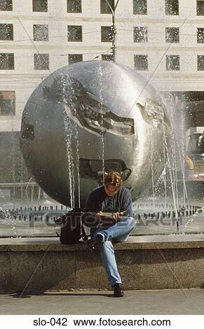 Man sat at Fountain Hodzovo Namestie Bratislava Slovakia View Large Photo Image Stock Image - Man sat at Fountain Hodzovo Namestie Bratislava Slovakia. Fotosearch