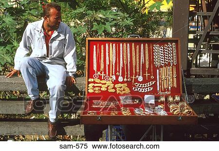 Man Selling Gold Chains on Street Caracas Venezuela View Large Photo Image Stock Photography - Man Selling Gold Chains on Street Caracas Venezuela. Fotosearch