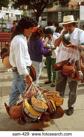 Man Selling Wine Skins on Street Quito Ecuador View Large Photo Image Stock Photo - Man Selling Wine Skins on Street Quito Ecuador. Fotosearch