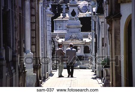 Men Walking Between Tombs in a Cemetery Argentina View Large Photo Image Stock Photo - Men Walking Between Tombs in a Cemetery Argentina. Fotosearch