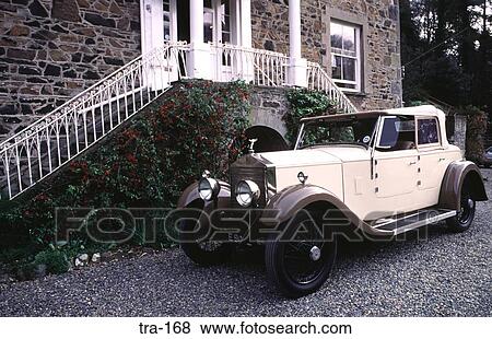 Old Cream and Brown Rolls-Royce in Front of Building View Large Photo Image Stock Photo - Old Cream and Brown Rolls-Royce in Front of Building. Fotosearch