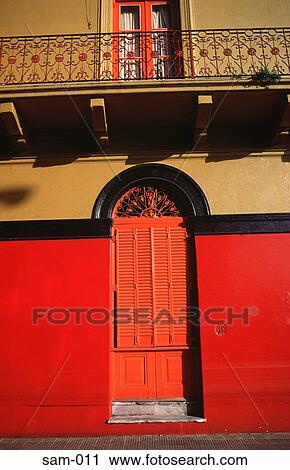 Orange Door in Red and Yellow Facade Argentina View Large Photo Image Stock Image - Orange Door in Red and Yellow Facade Argentina. Fotosearch