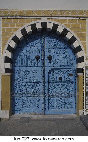 Stock Photo - Ornate Arched Door Sousse Tunisia. Fotosearch
