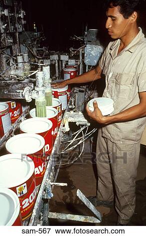 Stock Photo - Paint Tin Filling Machine Valencia Venezuela. Fotosearch