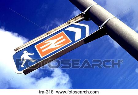 Pedestrian Sign Pointing to Station UK View Large Photo Image Stock Photo - Pedestrian Sign Pointing to Station UK. Fotosearch