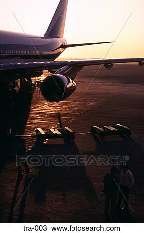 Stock Image - Plane being loaded Argentina. Fotosearch