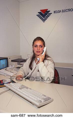 Stock Photo - Receptionist Answering Telephone Uruguay. Fotosearch