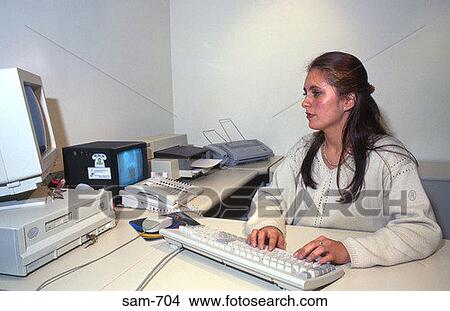 Receptionist Using Computer Montevideo Uruguay View Large Photo Image Picture - Receptionist Using Computer Montevideo Uruguay. Fotosearch