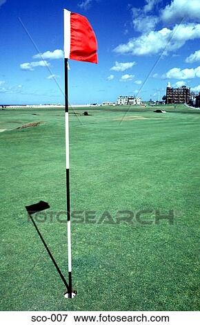 Red Flag in Hole on Green of St Andrews Golf Course View Large Photo Image Stock Photo - Red Flag in Hole on Green of St Andrews Golf Course. Fotosearch