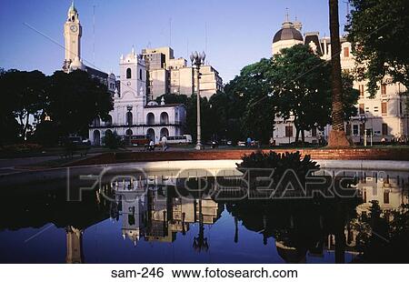 Stock Photograph - Reflection of Plaza de Mayo in Pond Buenos Aires. Fotosearch
