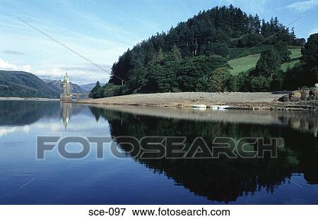 Reflection of Trees and Tower in a Welsh Lake UK View Large Photo Image Stock Photo - Reflection of Trees and Tower in a Welsh Lake UK. Fotosearch
