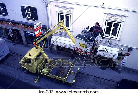 Repair Men on Truck Lift Schladming Austria View Large Photo Image Stock Image - Repair Men on Truck Lift Schladming Austria. Fotosearch