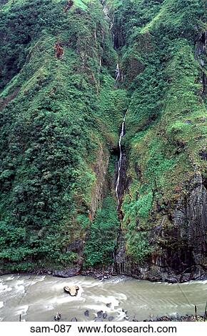 Stock Photo - Riverside Waterfall Ecuador. Fotosearch