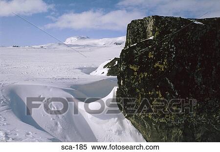 Rock Outcrop in Snowy Landscape Finse Norway View Large Photo Image Stock Photography - Rock Outcrop in Snowy Landscape Finse Norway. Fotosearch