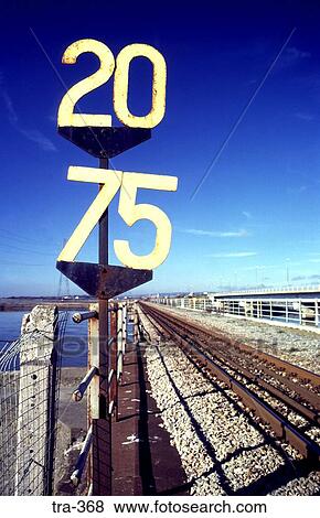 Stock Photo - Speed Restriction Signs by Railway Track. Fotosearch