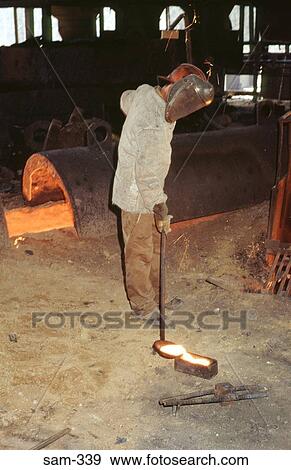 Steel Worker Pouring Test Ingot Paz del Rio Colombia View Large Photo Image Stock Photo - Steel Worker Pouring Test Ingot Paz del Rio Colombia. Fotosearch